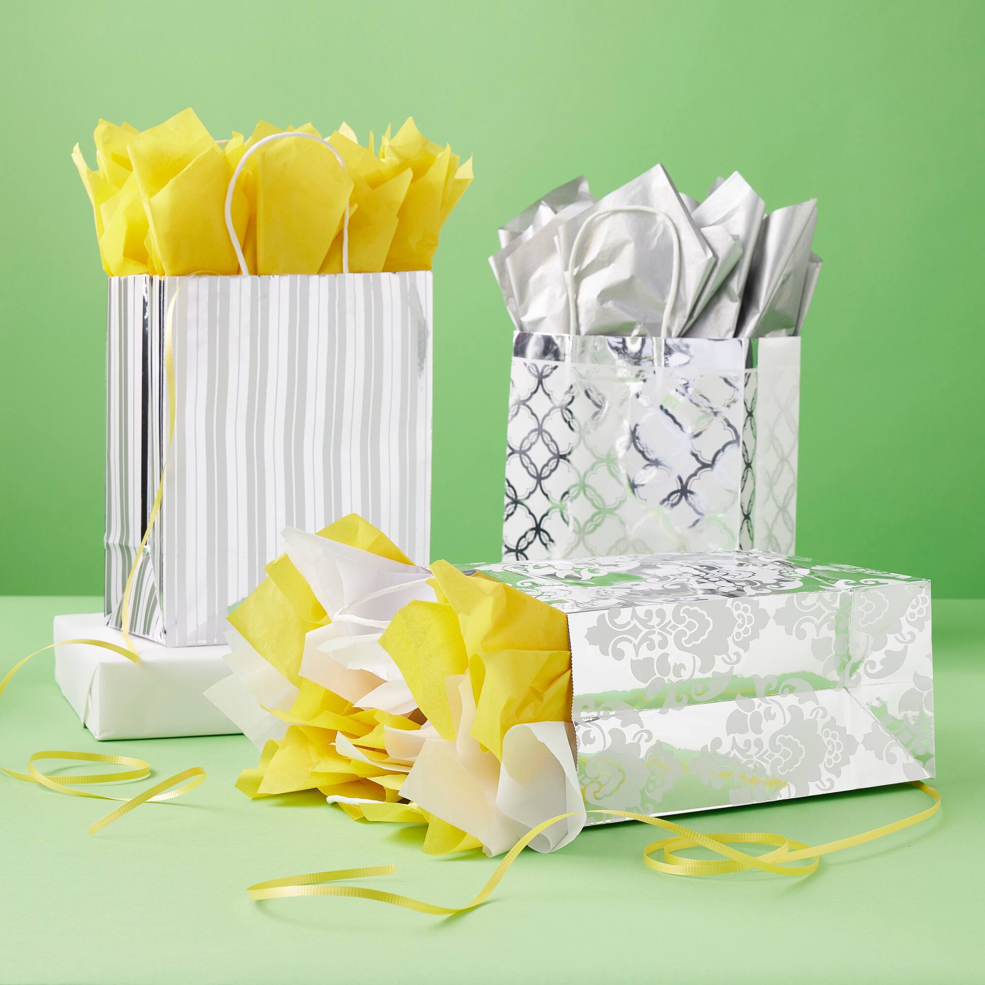 6 Packs: 13 ct. (78 total) Silver Mixed Print Gift Bag Value Pack by Celebrate It™